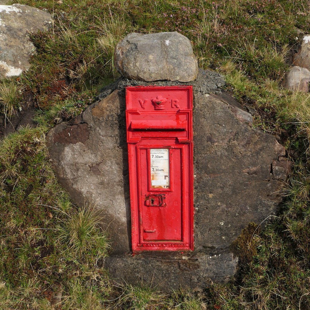 Red post box at Red Point in Scotland